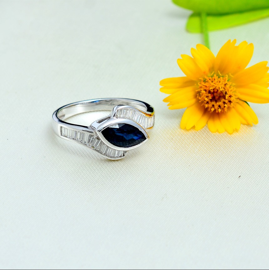 18KT White Gold Diamond Baguettes and Marquise Blue Sapphire